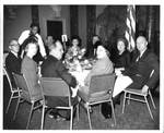 Felton and Wanda Johnston with others at a table. by Author Unknown