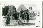 Post-card. Tourists on camels near the pyramids and Sphinx in Giza, Egypt. by Author Unknown