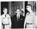 Felton M. Johnston with two Civil Air Patrol cadets. by United States. Civil Air Patrol