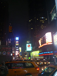 Times Square, at a corner by Photographer Unknown