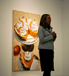 Lou Haney at Art Talk, standing by Lou Haney and Photographer Unknown