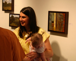 Woman and baby at reception by David Jewell and Photographer Unknown