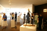 Gallery reception. Natural light. by Photographer Unknown