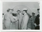 Gartin shaking hand with man in military uniform by Standard Photo Co. (Jackson, Miss.)