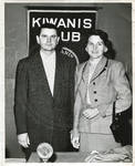 Carroll Gartin standing next to unidentified woman at Kiwanis Club meeting by J. R. Ford Photos (Laurel, Miss.)