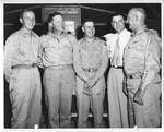 Gartin with military personnel by United States. Army