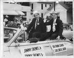 Gartin riding in parade with Governor Frank Clements by Author Unknown