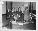 Gartin with two unidentified men being sworn in by Author Unknown