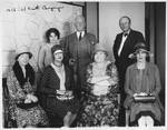 Pat Harrsion with group of people from the Al Smith campaign. by Price Picture News