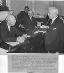 Pat Harrison with Secretary of State Cordell Hull and Senator Arthur Capper. by Acme Newspictures (New York, N.Y.)