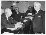 Harrison with Secretary of State Cordell Hull. by International News Photos (New York, N.Y.)