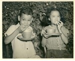 October 1941 [Robullo] School Children Eating mid morning meal Rolled oats - Milk and Sugar With Raisins Graham Cracker by Donna Matsufuru Hawaii Collection
