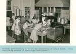Students participating in an all day preparation of school lunch. Note sterilizing machine in lower right hand corner. by Hawaii Donna Matsufuru Collection