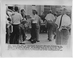 University of Mississippi Registrar, Robert B. Ellis, talks to students standing in line to register for classes by Edward Movitz