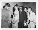 Eastland with soldiers and officers examining radio equipment. by United States. Air Force