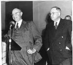 Robert A. Taft of Ohio speaking at a microphone with Eastland standing behind him by Author Unknown