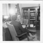 Series of photographs of filmed interview of Eastland by an unidentified man in his Washington, D.C. office. by Author Unknown