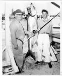 Two unidentified men with large fish by Chauncey T. Hinman (Gulfport, Miss.)