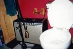 Recording a toilet by Kudzu Kings (Musical Group)