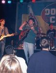 Playing a show: electric guitar, acoustic guitar, drums by Kudzu Kings (Musical Group)