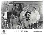 Band in front of old delivery truck, black and white, with booking information by Kudzu Kings (Musical Group)