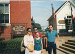 Leslie family in front of the Sister Cities sign by Oxford City Hall. by Author Unknown