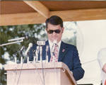John Leslie behind podium on Bill Waller Day, image 001 by Author Unknown