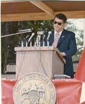 John Leslie behind podium on Bill Waller Day, image 002 by Author Unknown