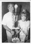 John Leslie with Miss Cinderella Miss. by Author Unknown