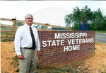 John Leslie in front of the Mississippi State Veterans Home sign. by Author Unknown