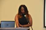 Female student stands at podium, horizontal by Mississippi Alliance for Minority Participation