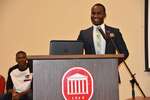 Male student seated, male student at podium, horizontal by Mississippi Alliance for Minority Participation