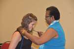 Ms. Vinson presents blue cord to Laura Cline, horizontal by Mississippi Alliance for Minority Participation
