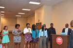 Students stand to right of podium by Mississippi Alliance for Minority Participation