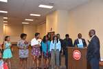 Students laugh to right of podium by Mississippi Alliance for Minority Participation