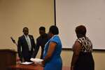 Two male students at podium with Ms. Vinson and Ms. Brown, horizontal by Mississippi Alliance for Minority Participation