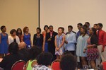 2015. Participants stand in front of seated audience by Mississippi Alliance for Minority Participation