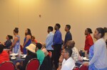 2015. Participants stand in line to receive t-shirts by Mississippi Alliance for Minority Participation