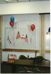Dry erase board with American flags and balloons by Author Unknown