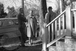 Two unidentified men and a woman standing outside at Rowan Oak: Image 1 by Edwin E. Meek