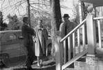 Two unidentified men and a woman standing outside at Rowan Oak: Image 2 by Edwin E. Meek