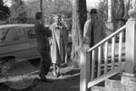 Two unidentified men and a woman standing outside at Rowan Oak: Image 3 by Edwin E. Meek