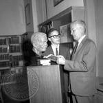 Jim Webb and unidentified man standing next to bust of William Faulkner: Image 6 by Edwin E. Meek