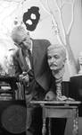 Jim Webb standing with Faulkner bust in process: Image 1 by Edwin E. Meek