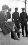 Three ROTC students staring at young woman's legs: Image 2 by Edwin E. Meek