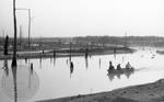 View of men on boat at Hurricane Landing by Edwin E. Meek