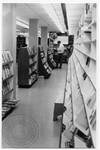 Bookstore or library interior by Edwin E. Meek