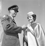Pat McRaney receiving medal: Image 1 by Edwin E. Meek