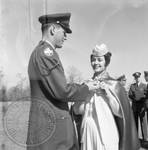 Pat McRaney receiving medal: Image 2 by Edwin E. Meek