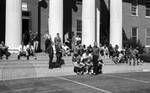 News reporters and students gather on Lyceum steps: Image 1 by Edwin E. Meek